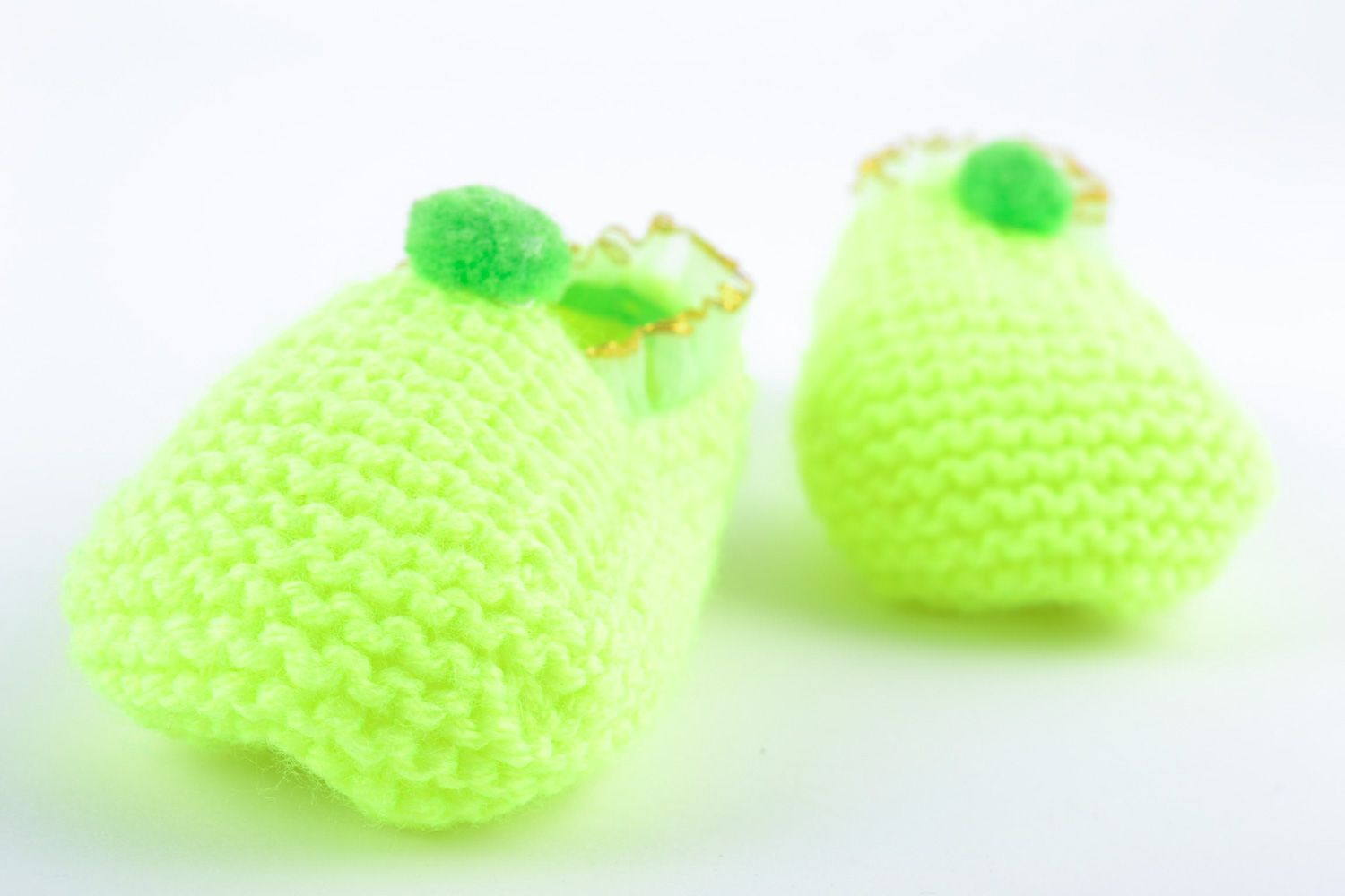 Beautiful light hand knitted wool slippers of lime color photo 5
