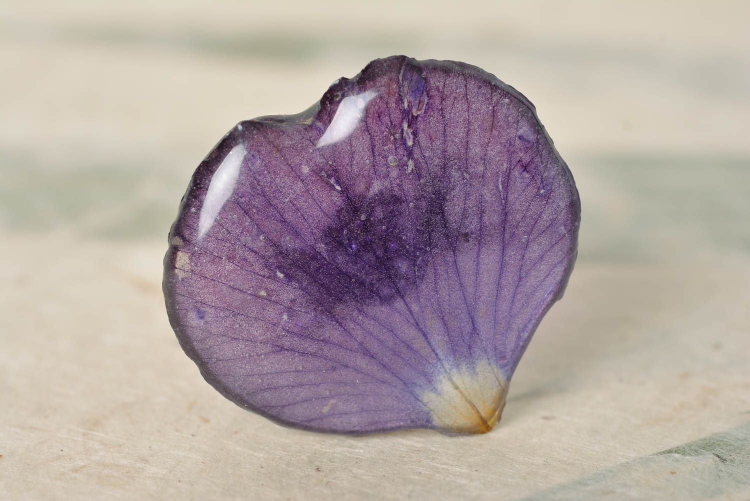 Unusual elegant violet ring with dried flower petal coated with epoxy photo 1
