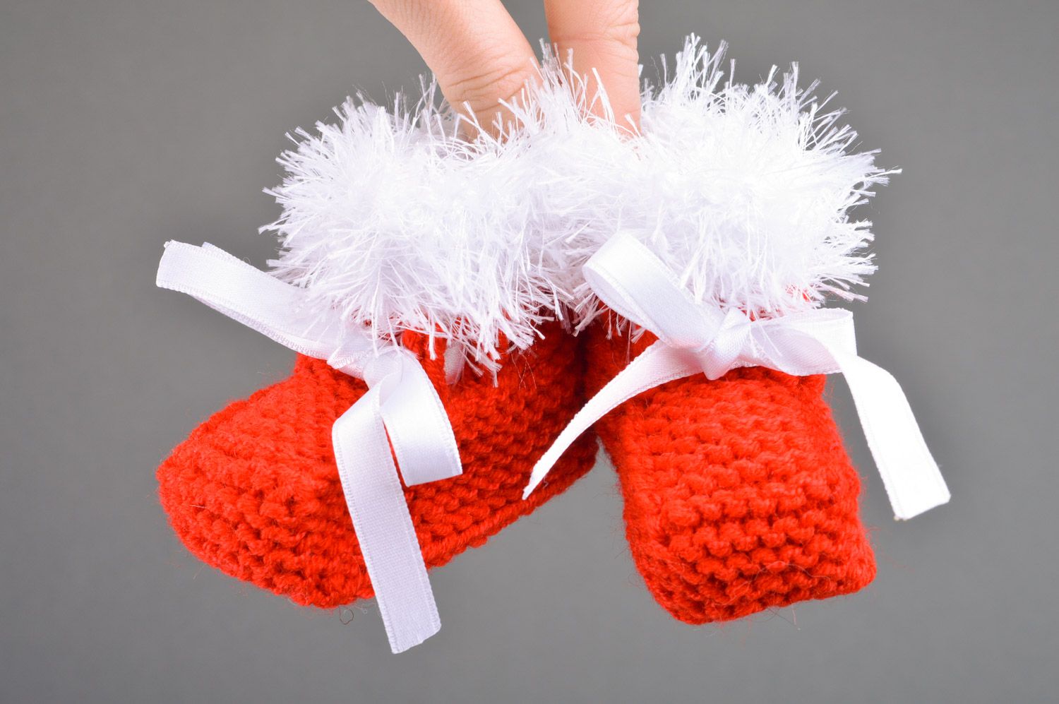 Red handmade knitted half-woolen baby booties with satin bows photo 3