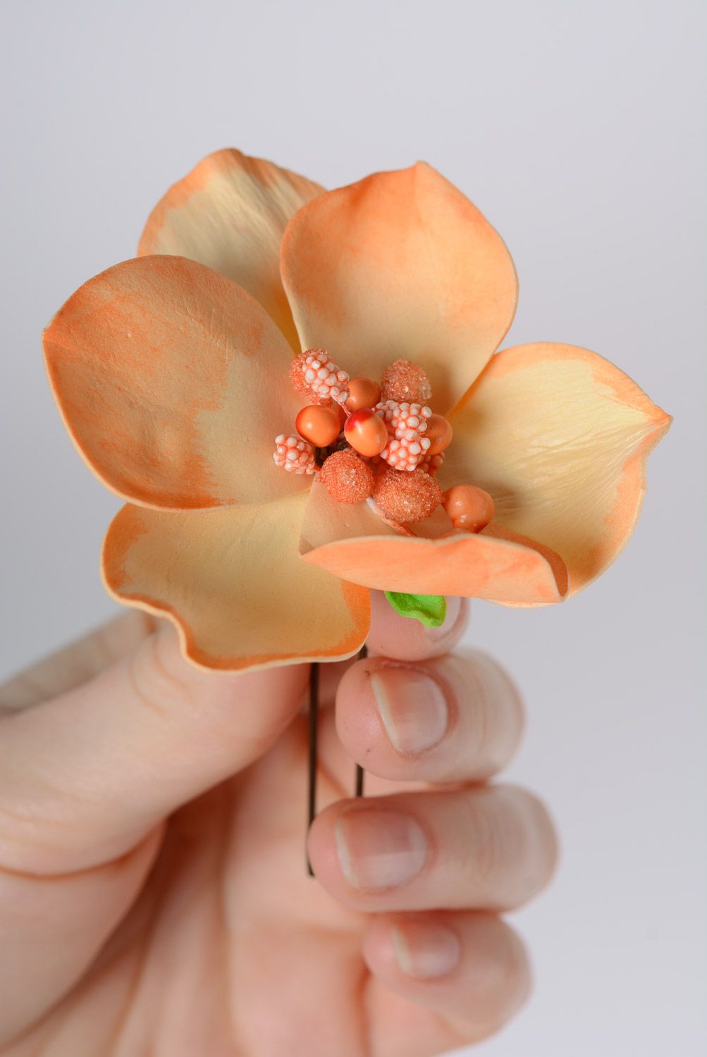 Handmade beautiful orange plastic hair pin made of suede and foamiran orchid flower photo 2
