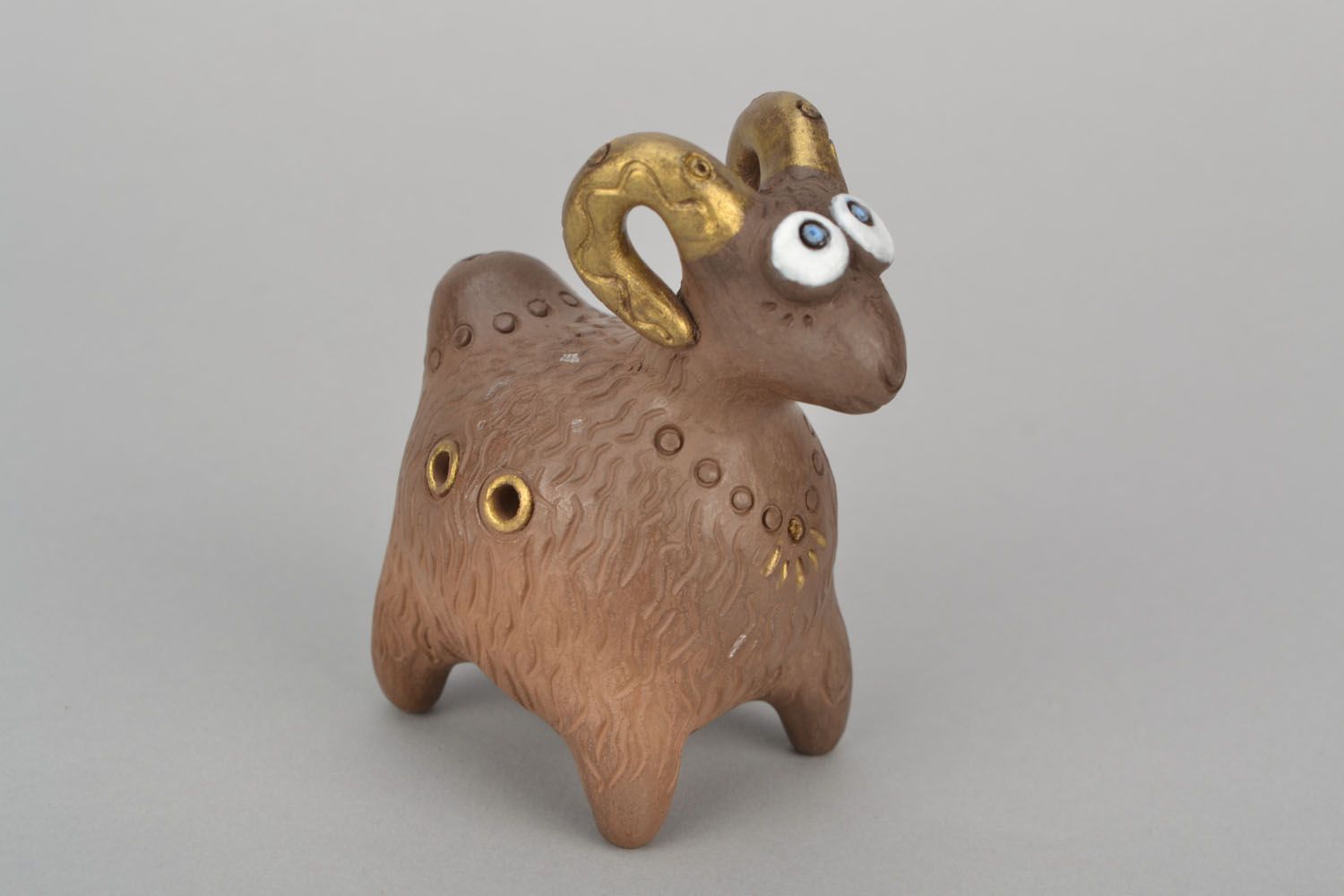 Clay penny whistle in the shape of ram photo 3