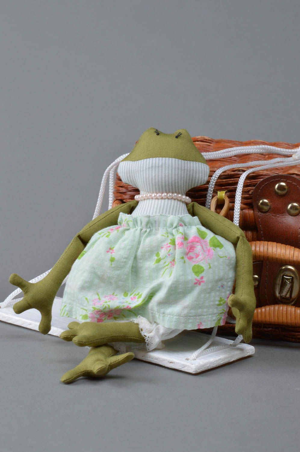 Handmade cotton fabric soft toy frog in skirt with bead necklace on swing photo 1