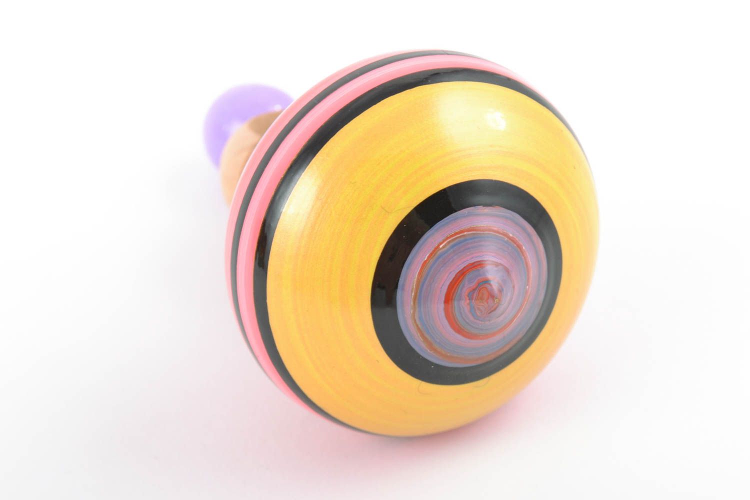 Bright small striped handmade wooden spinning top for children photo 4