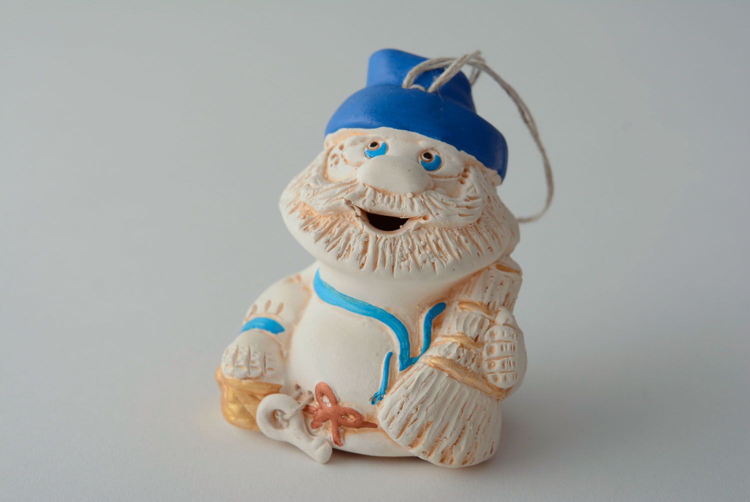Ceramic bell in the shape of old man photo 1