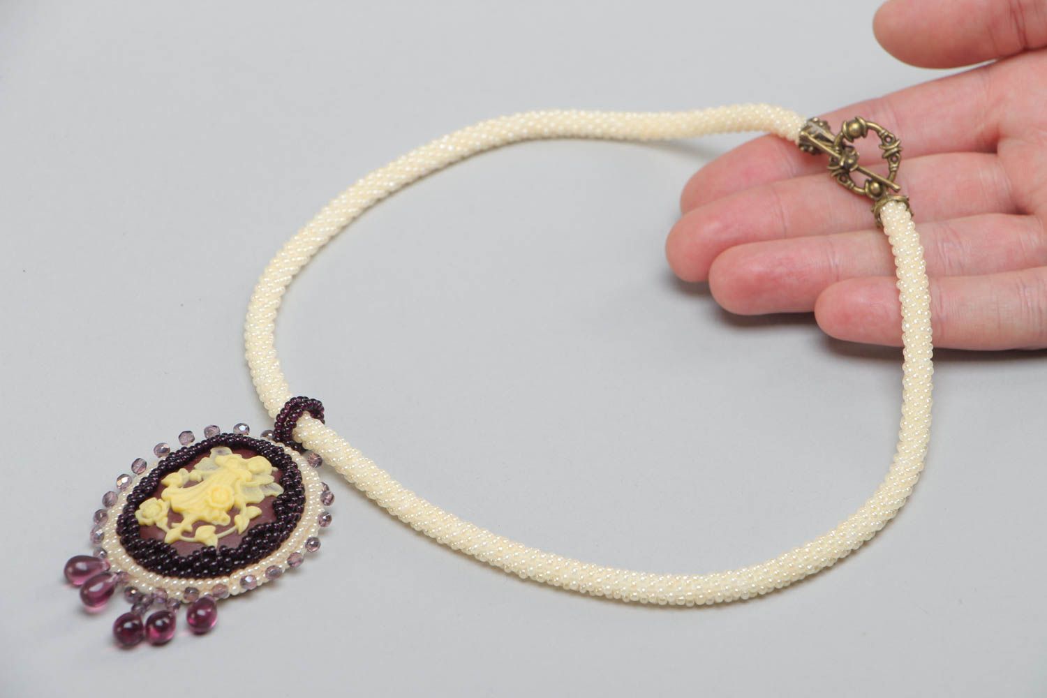 Light oval handmade unusual beaded pendant for women photo 5