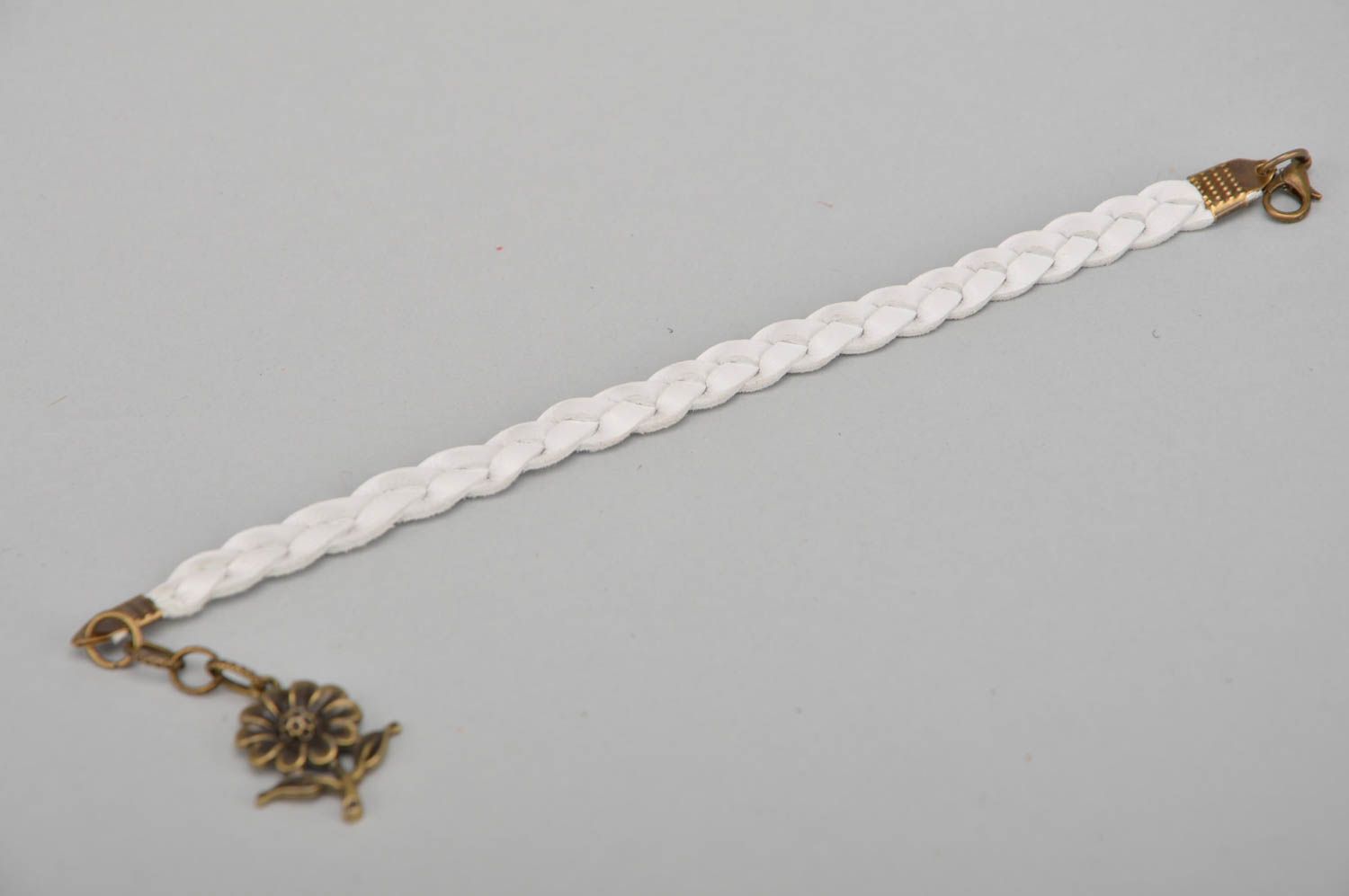 Handmade white genuine leather woven wrist bracelet of laconic design for women photo 3