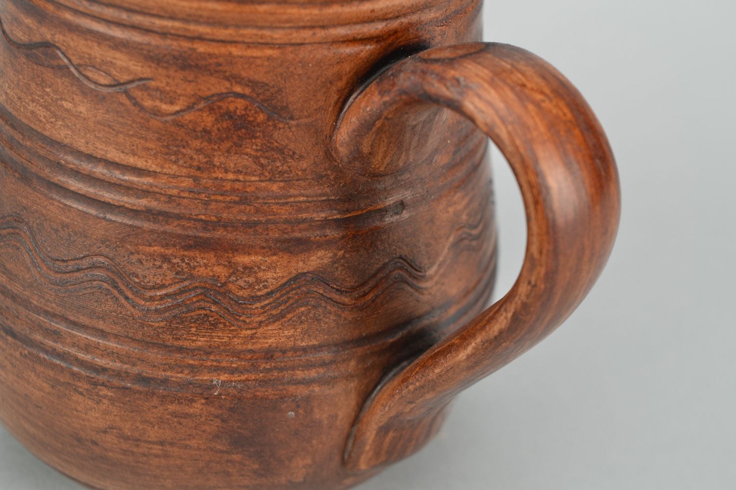 11 oz clay glazed coffee cup in rustic design with handle and no pattern photo 3