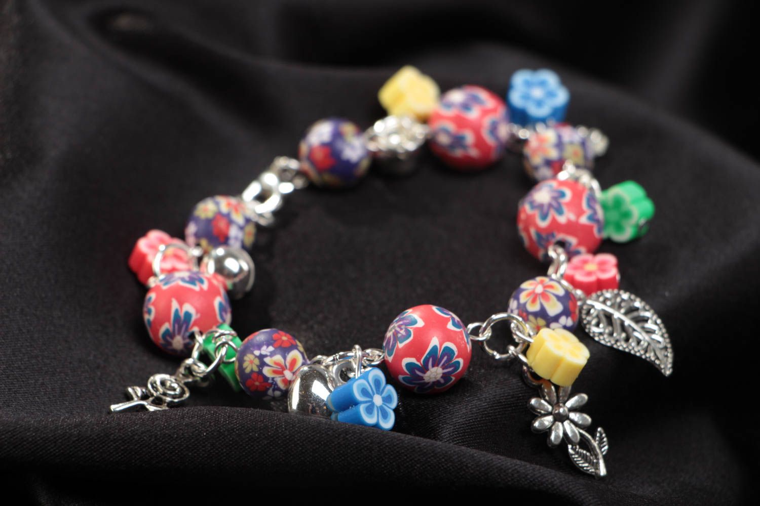 Bright handmade children's polymer clay wrist bracelet with beads and charms photo 1