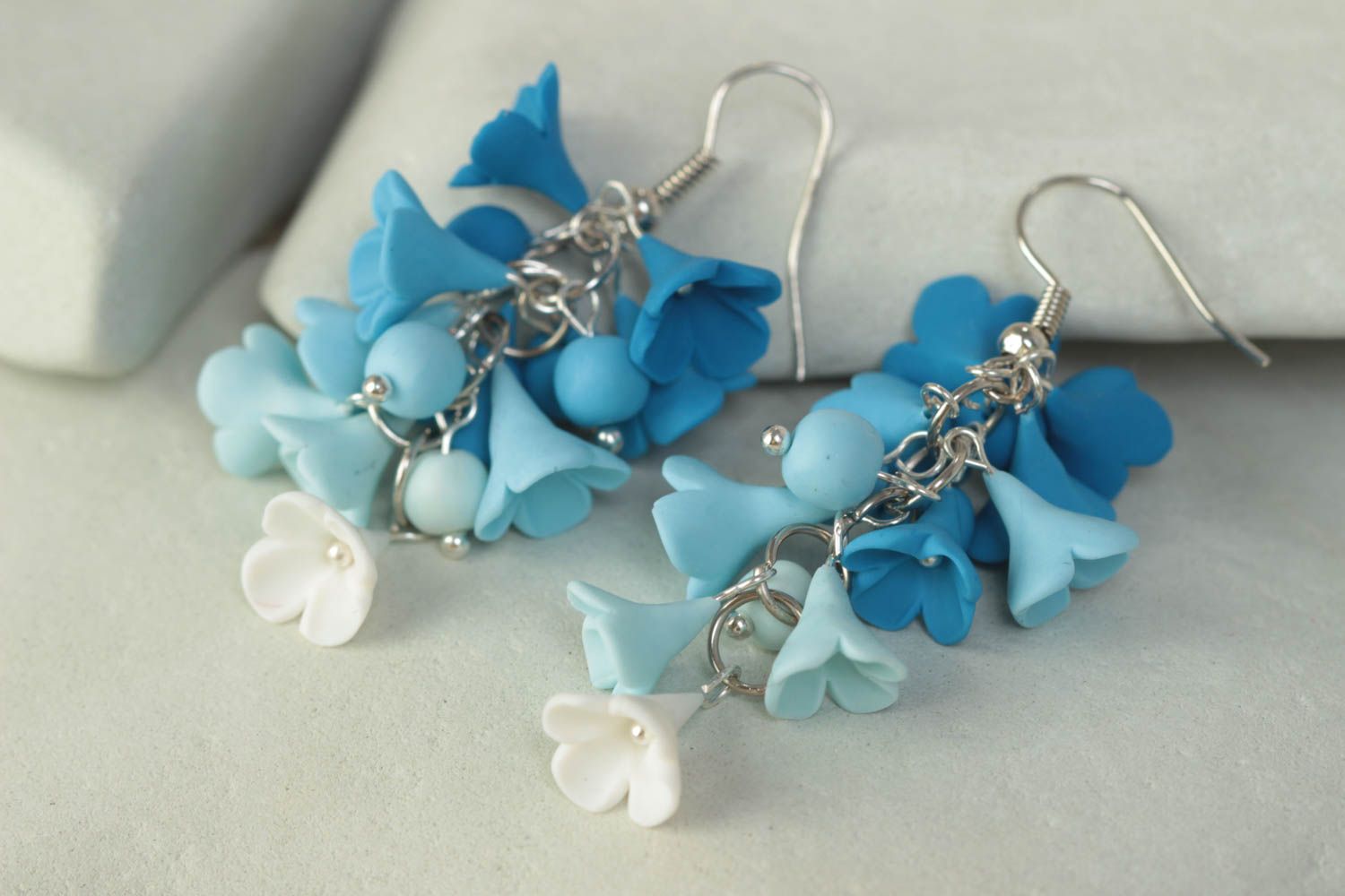 Handmade designer polymer clay flower dangle earrings in blue color palette photo 1