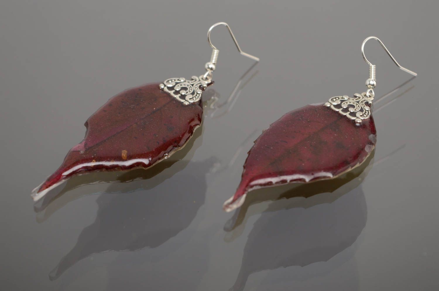 Dangle earrings with real leaves of wild grapes coated with epoxy resin photo 1
