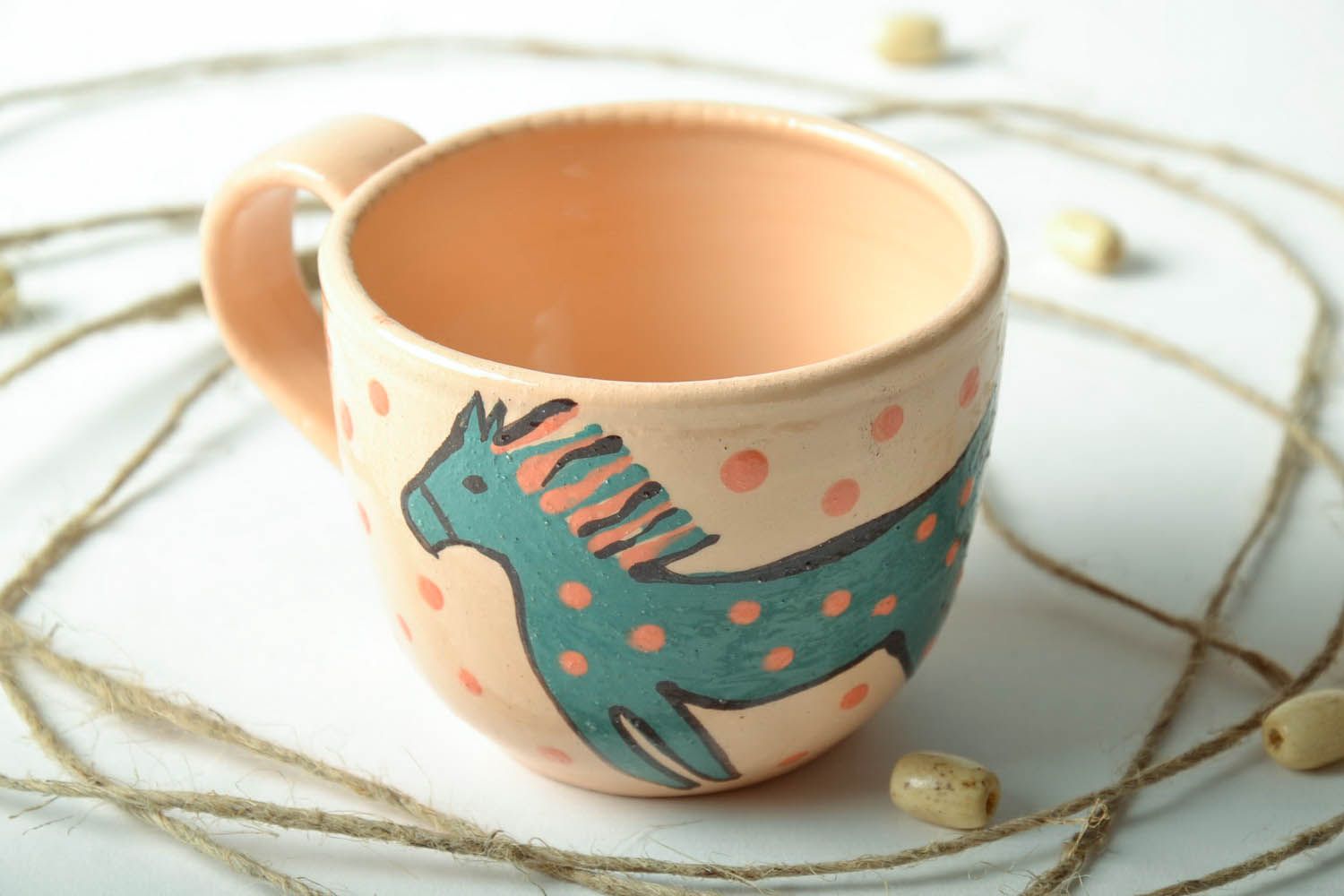 Ceramic tea cup in beige color with handle and bird pattern for kids photo 1