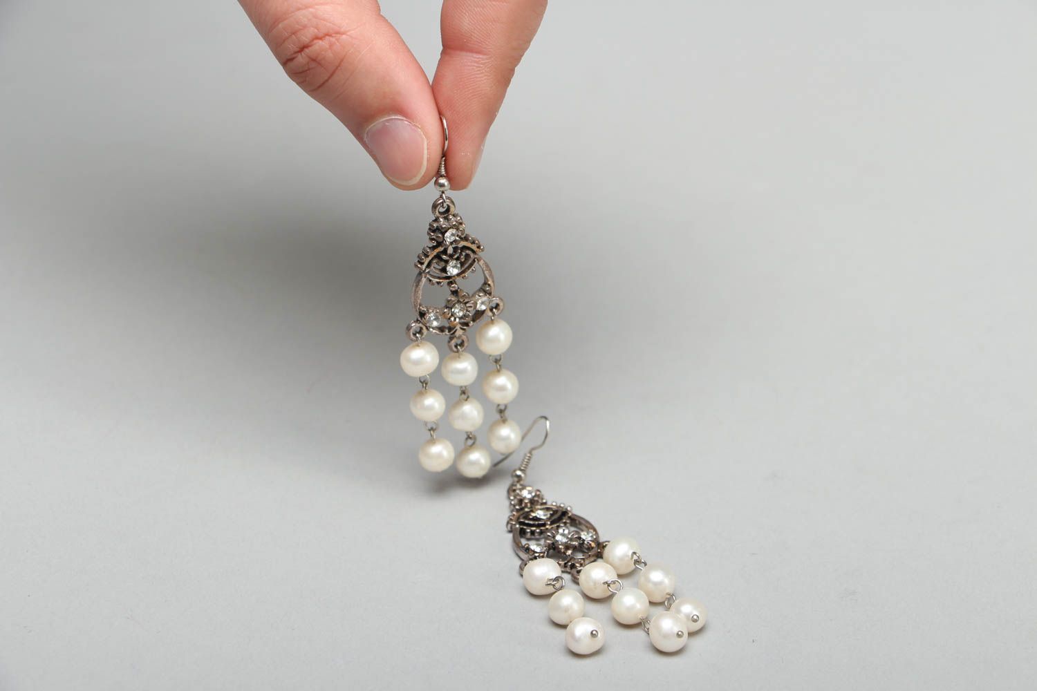 Metall Ohrringe mit Perlen foto 3
