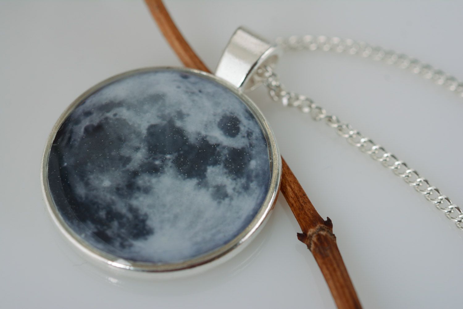 Tender blue round pendant with natural plant in epoxy resin on chain handmade photo 1