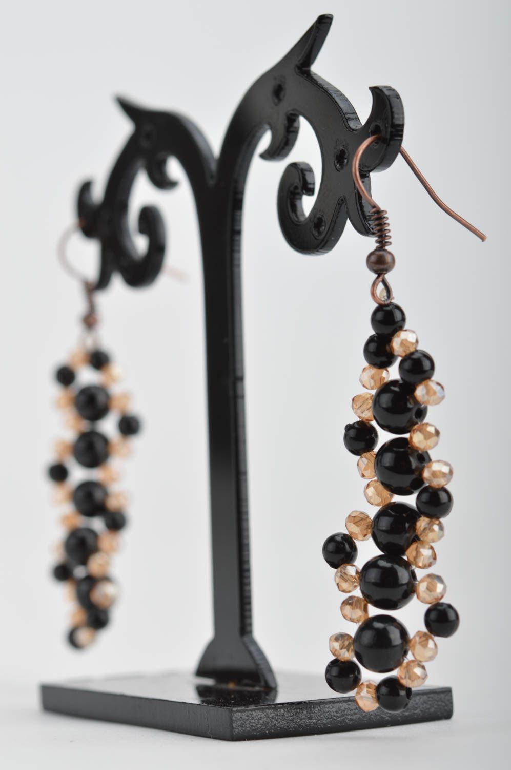 Stylish handmade earrings with rock crystal and ceramic beads black and gold photo 2
