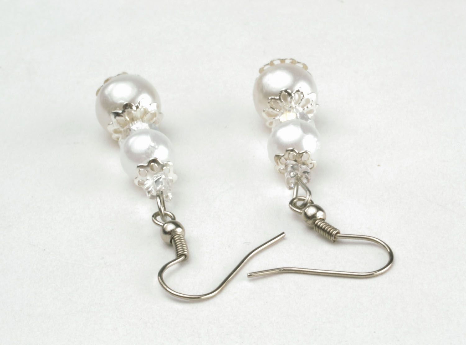 Ohrringe mit künstlichen Perlen foto 2