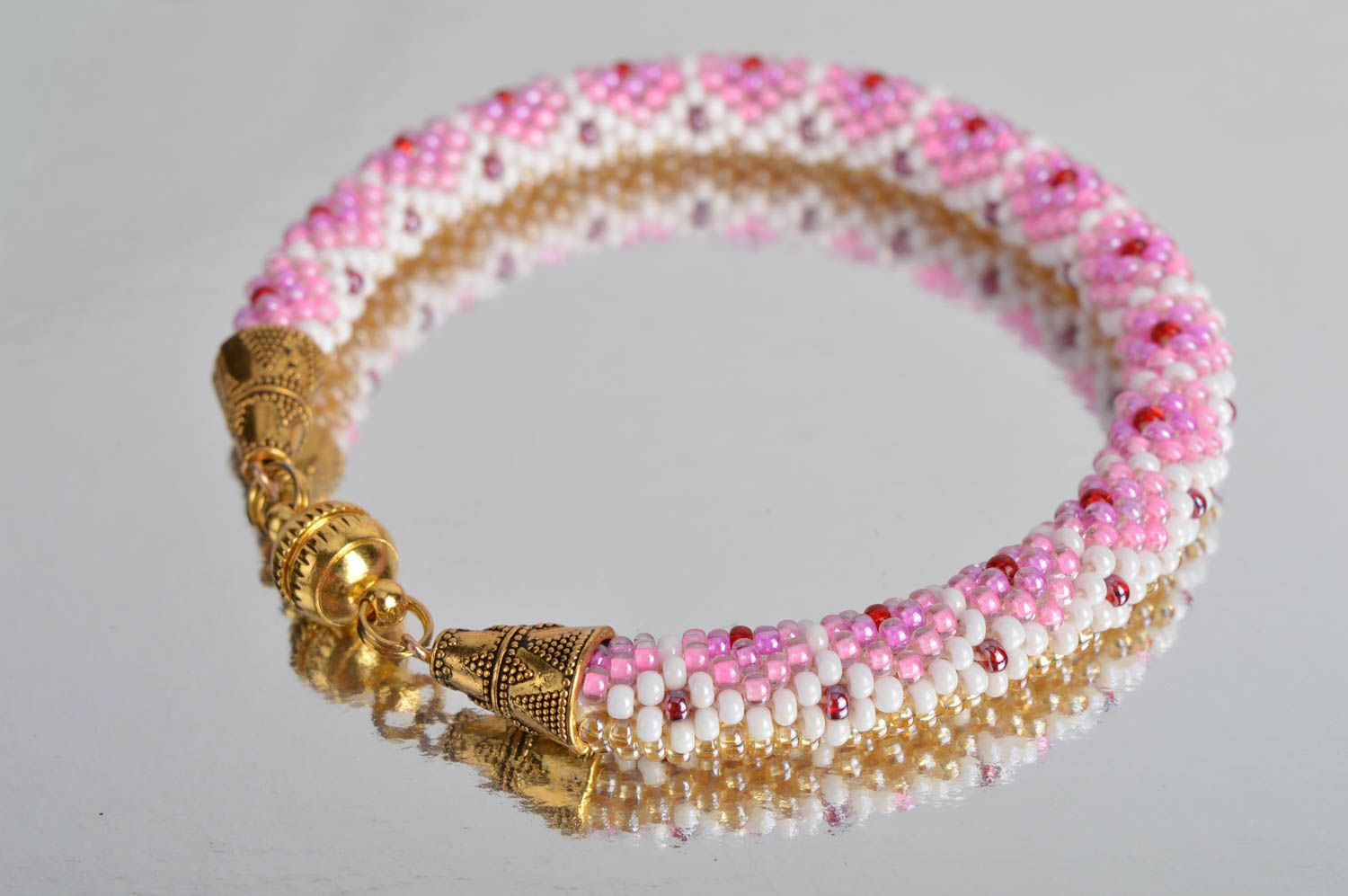 Bracelet spirale fait main Bijou fantaisie Cadeau femme rose perles de rocaille photo 1