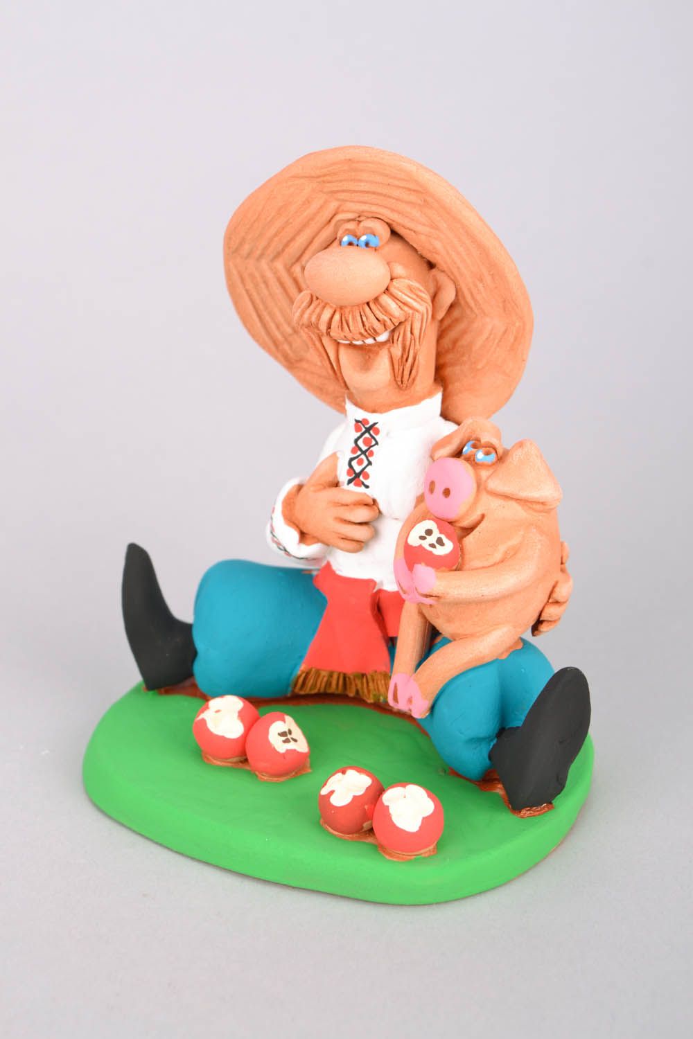 Figurine céramique 'Cosaque avec un cochon' photo 3