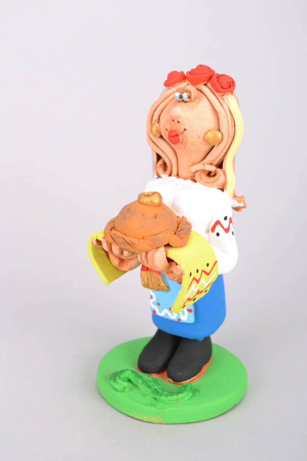 Funny clay figurine Cossack Woman with Ethnic Round Loaf photo 3