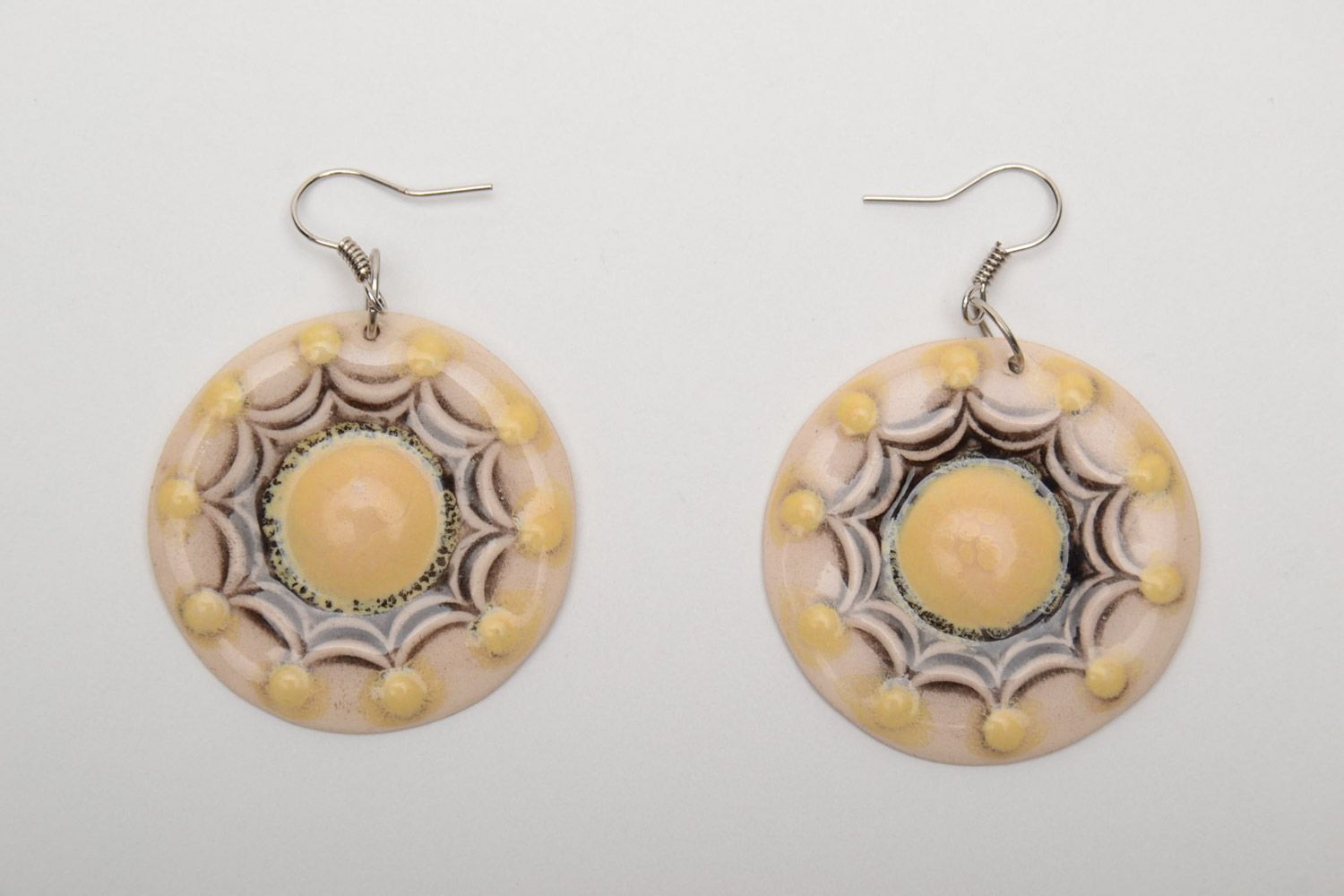 Handmade beige ceramic dangle earrings of round shape painted with enamels photo 5