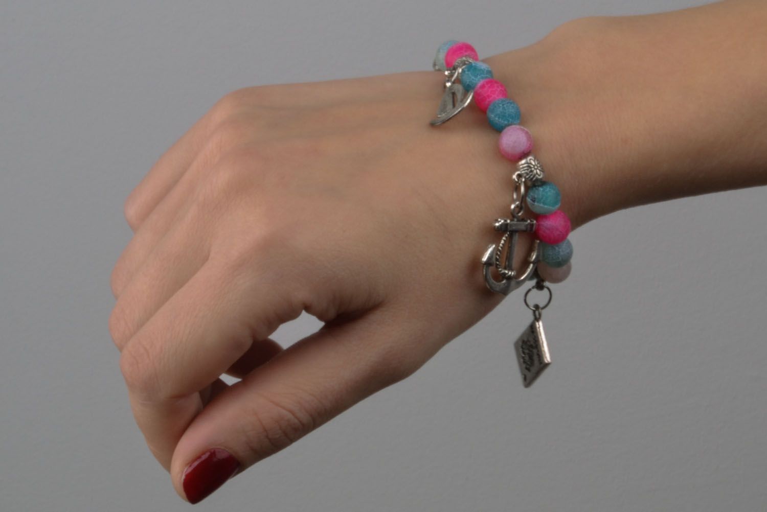 Beautiful bracelet with charms photo 3