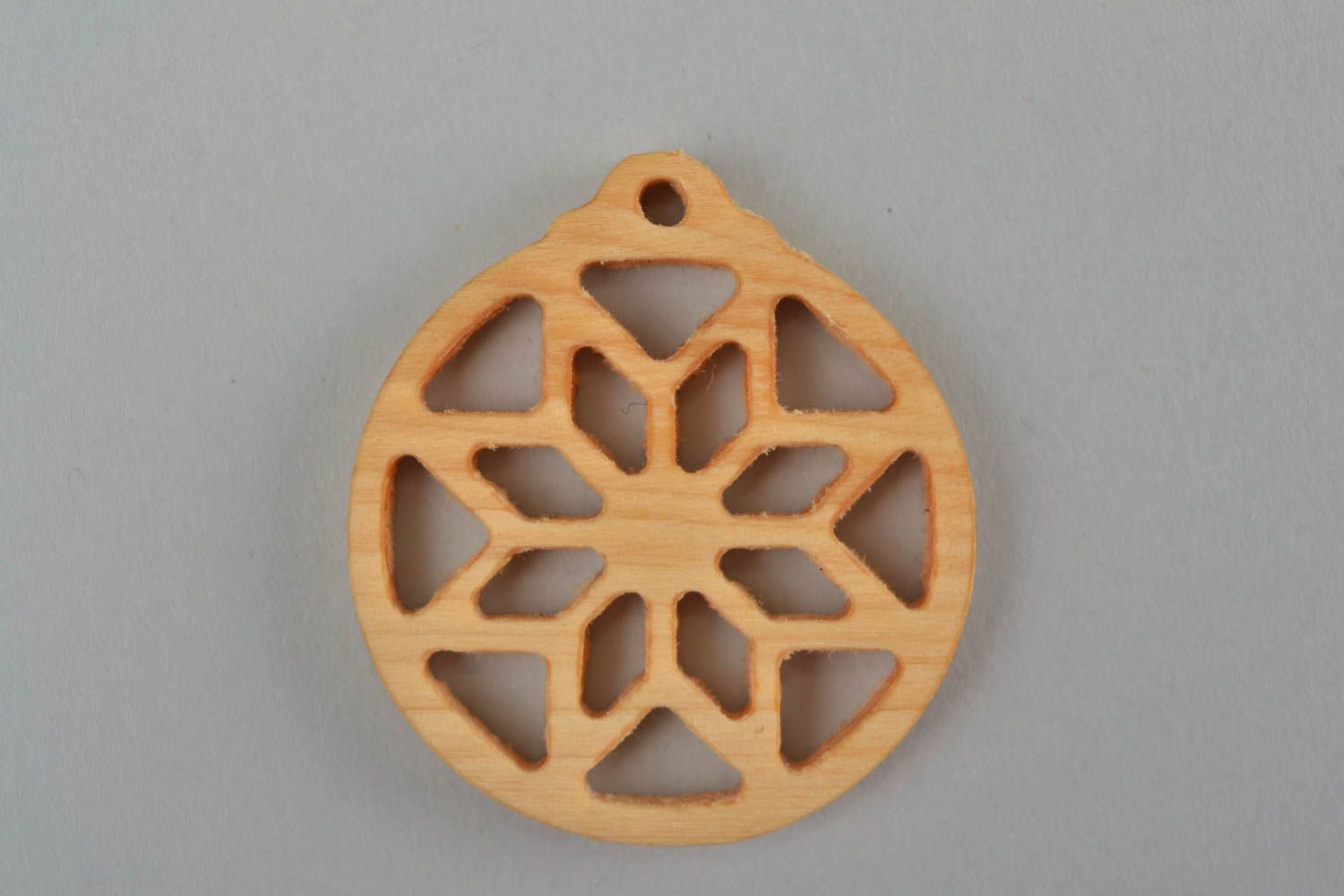 Slavonic handmade round amulet pendant made of wood with open-work photo 3