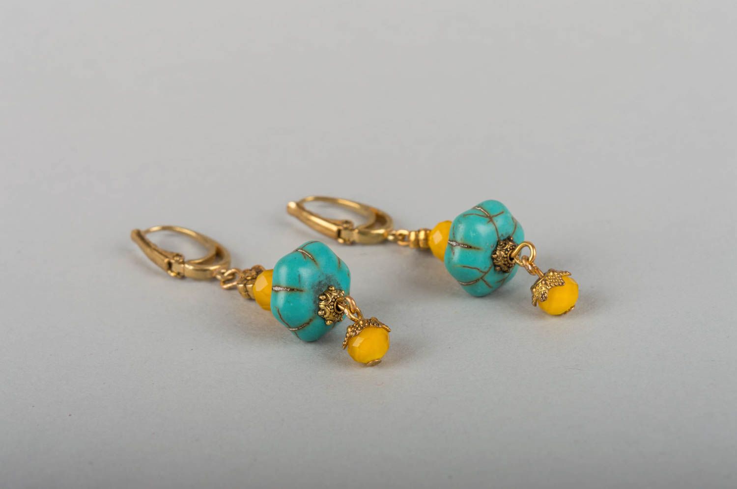 Beautiful handmade designer brass earrings with natural turquoise stone photo 4
