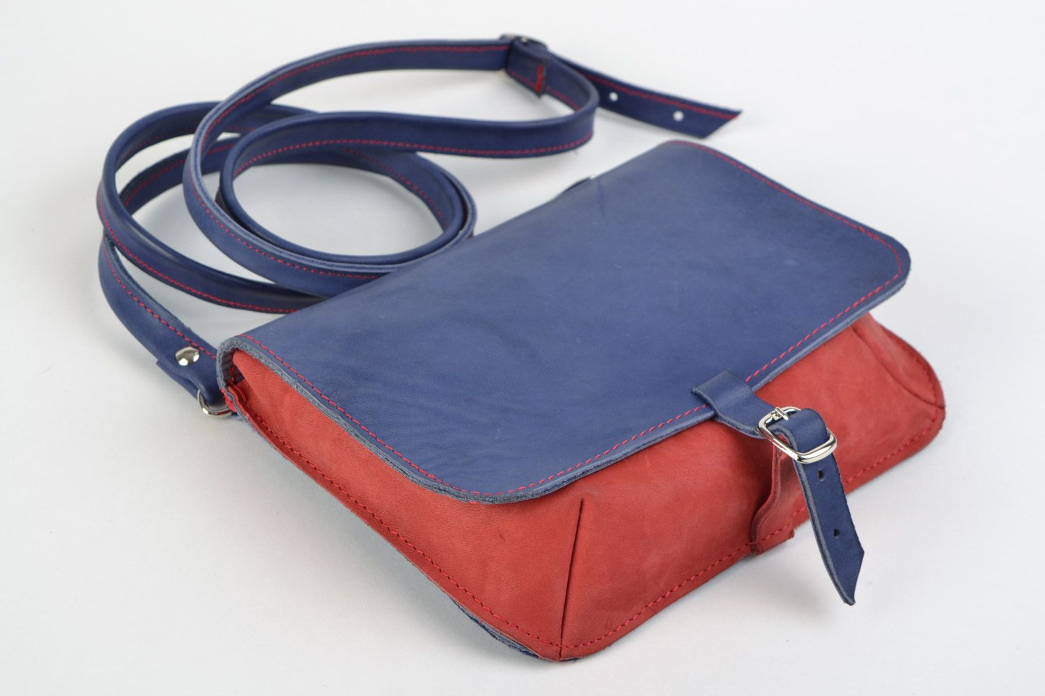Handmade genuine leather clutch bag in blue and red colors with long handle  photo 1