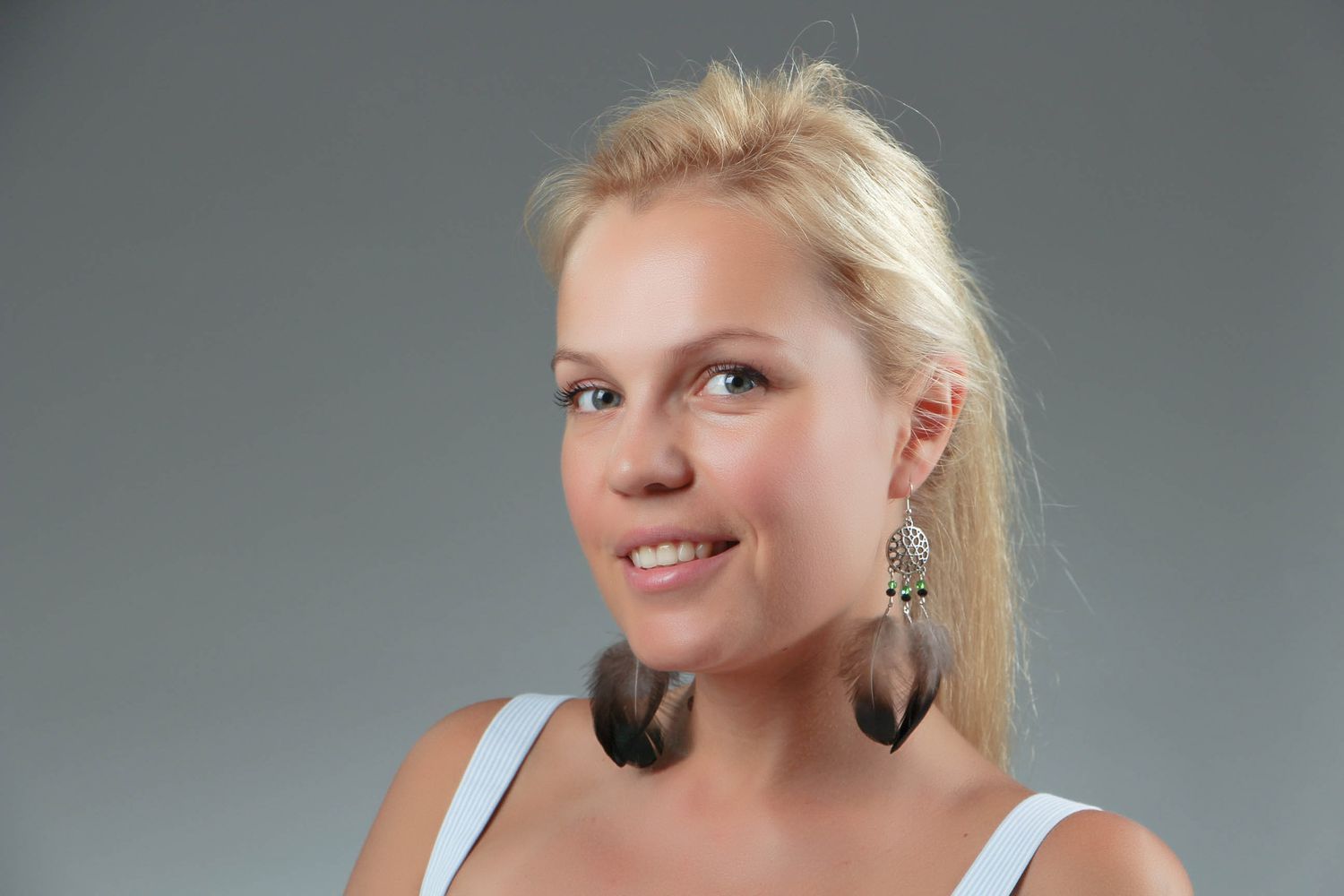 Earrings with feather photo 4