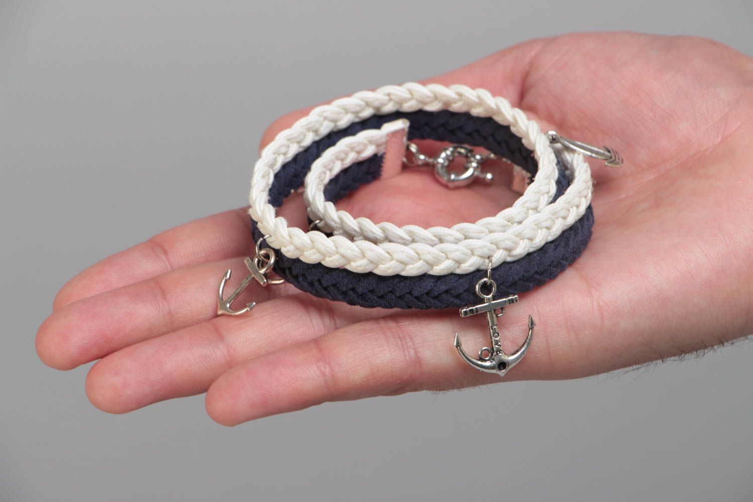 Handmade multi row wrist bracelet woven of suede cord in marine style with charm photo 5