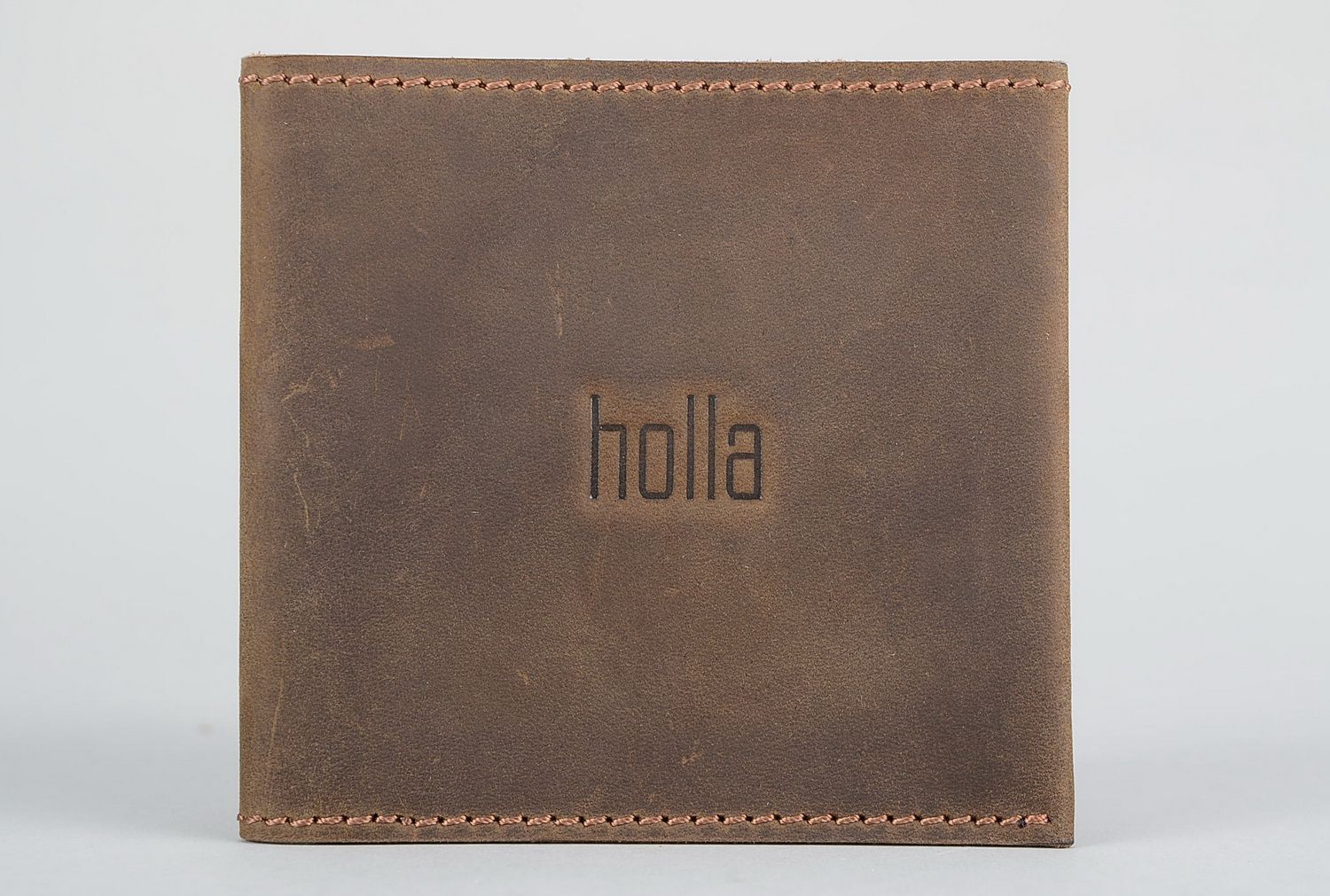 Wallet made from natural brown leather photo 1