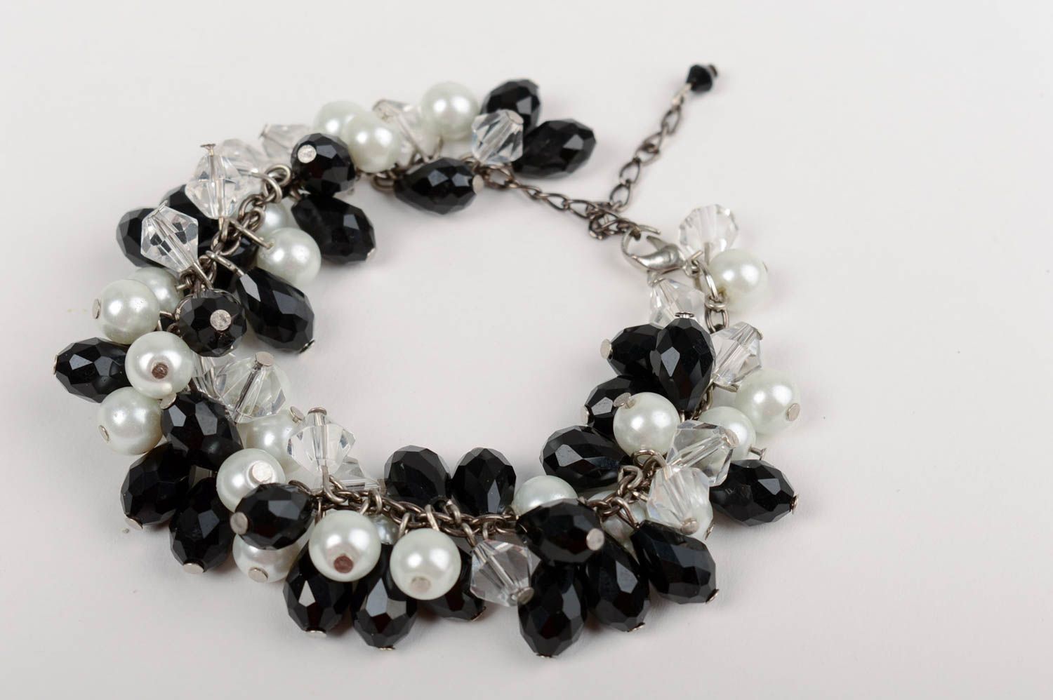 Handmade beautiful festive black and white wrist bracelet made of crystal beads  photo 2