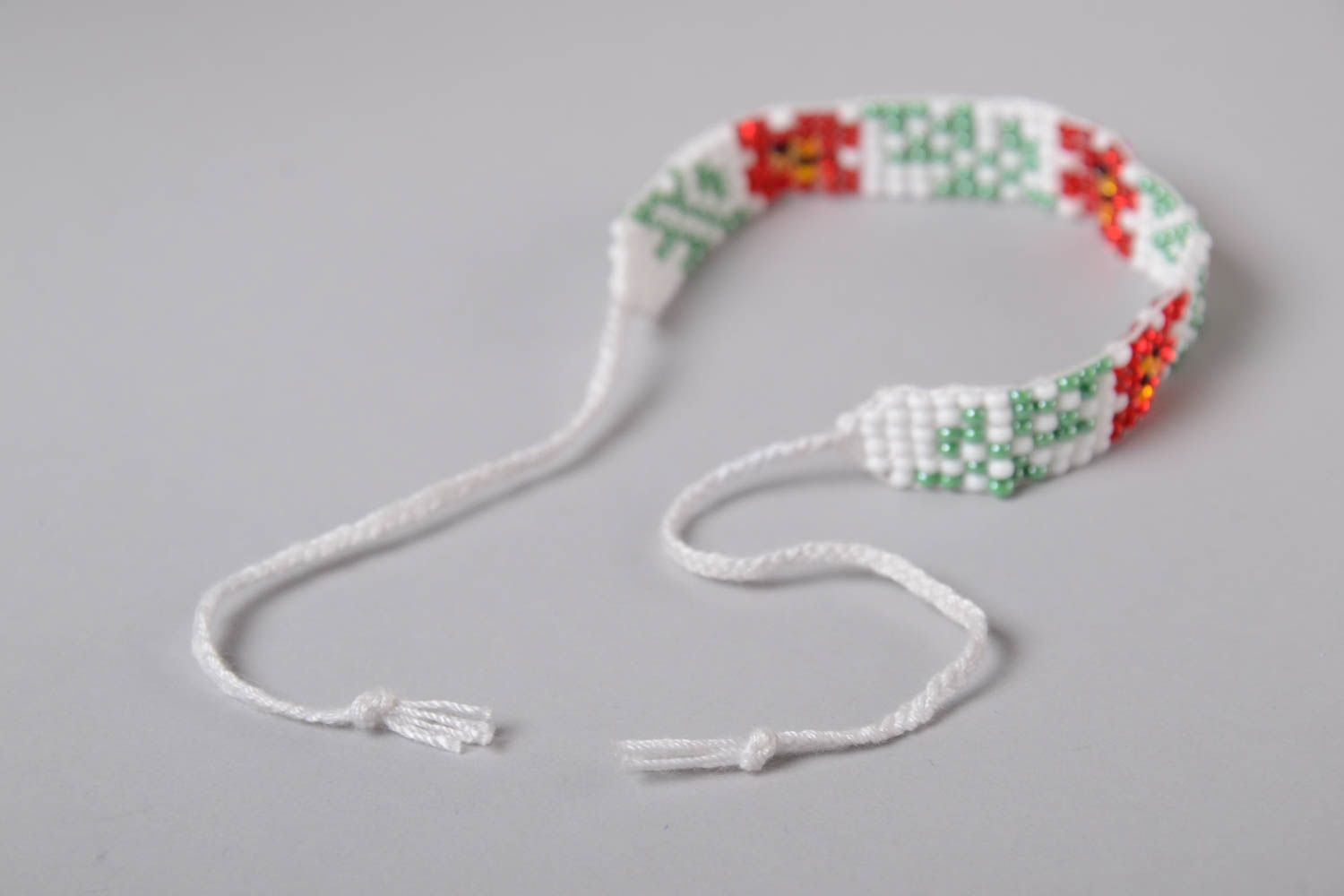 Stilvolles Damen Designer geflochtenes Armband aus Glasperlen weiß rot grün foto 5