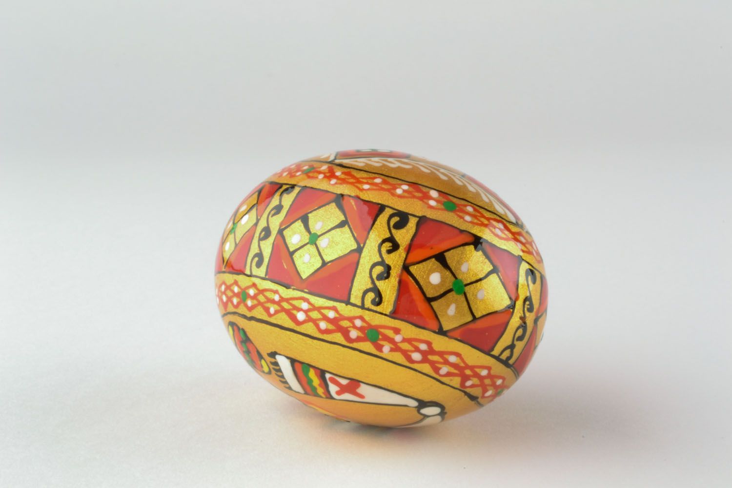 Bemaltes Ei aus Holz foto 4