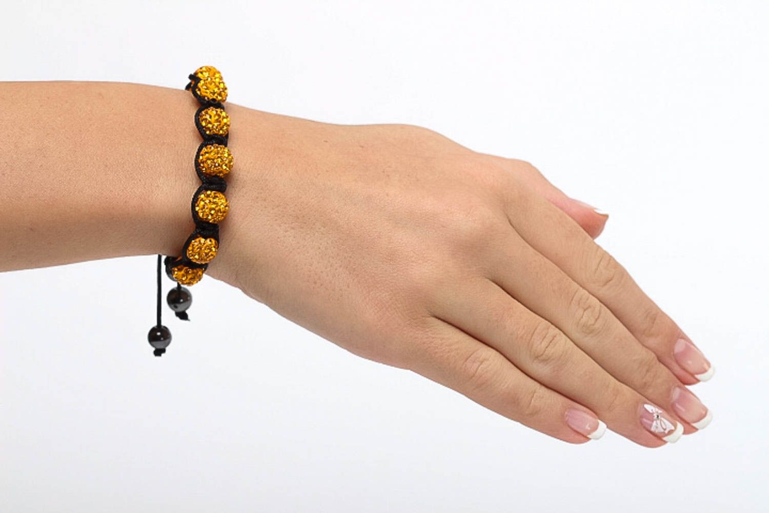 Gold color beads bracelet on the black rope for women photo 5