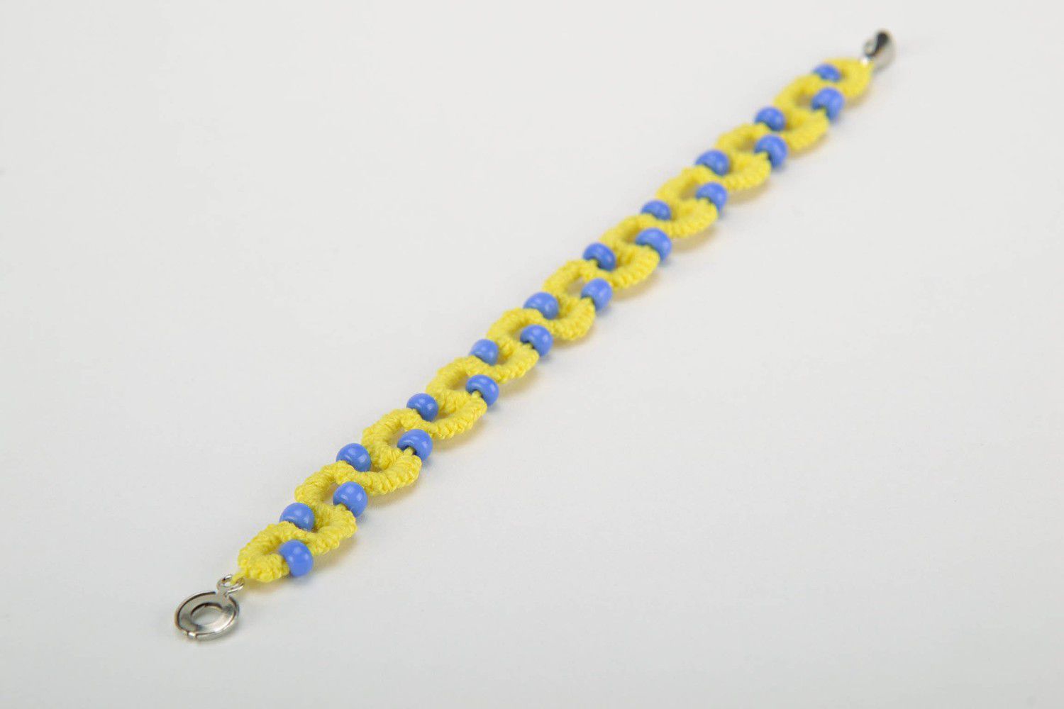 Yellow and blue bracelet made from cotton threads photo 2