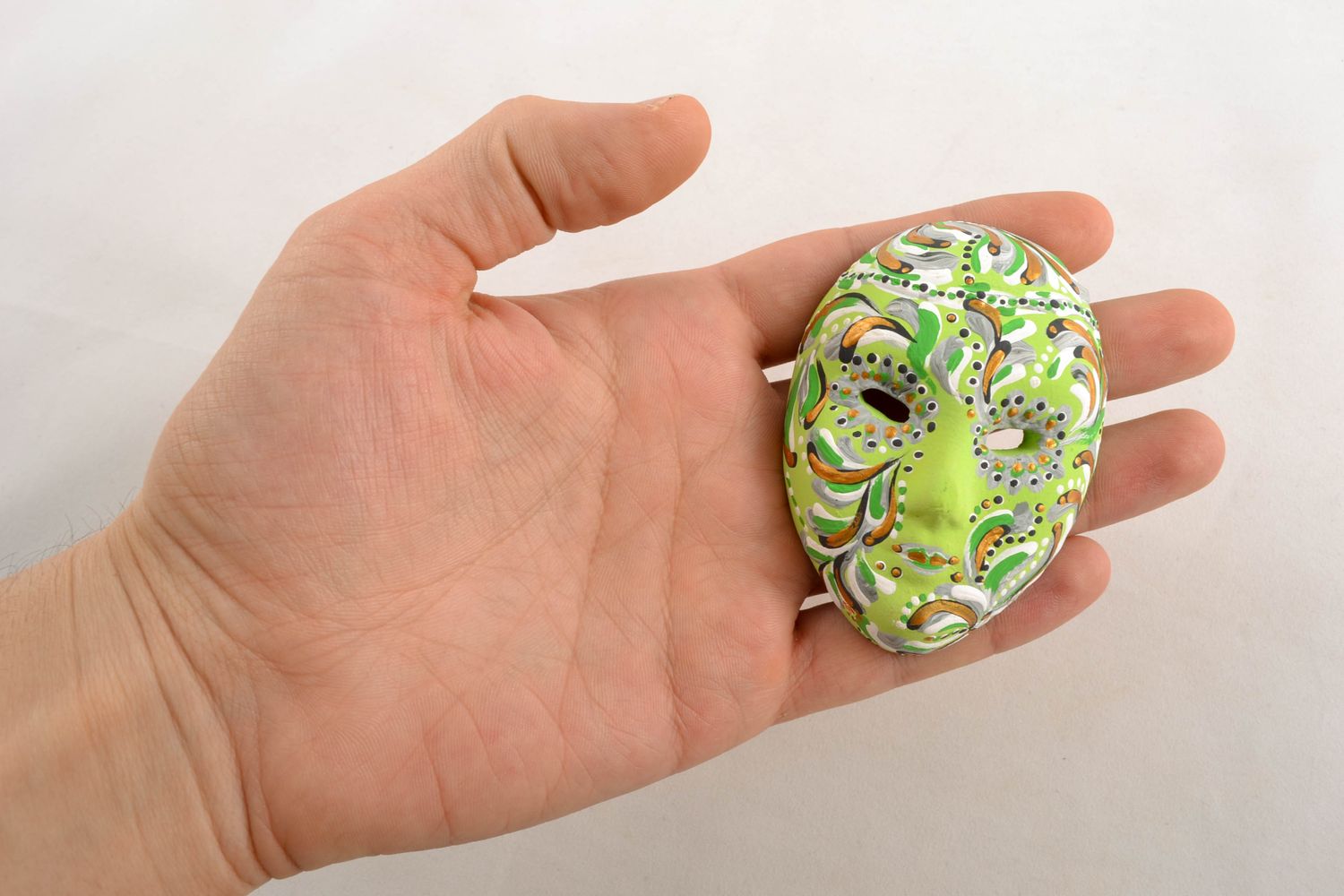 Fridge magnet in the shape of carnival mask in green color palette photo 1