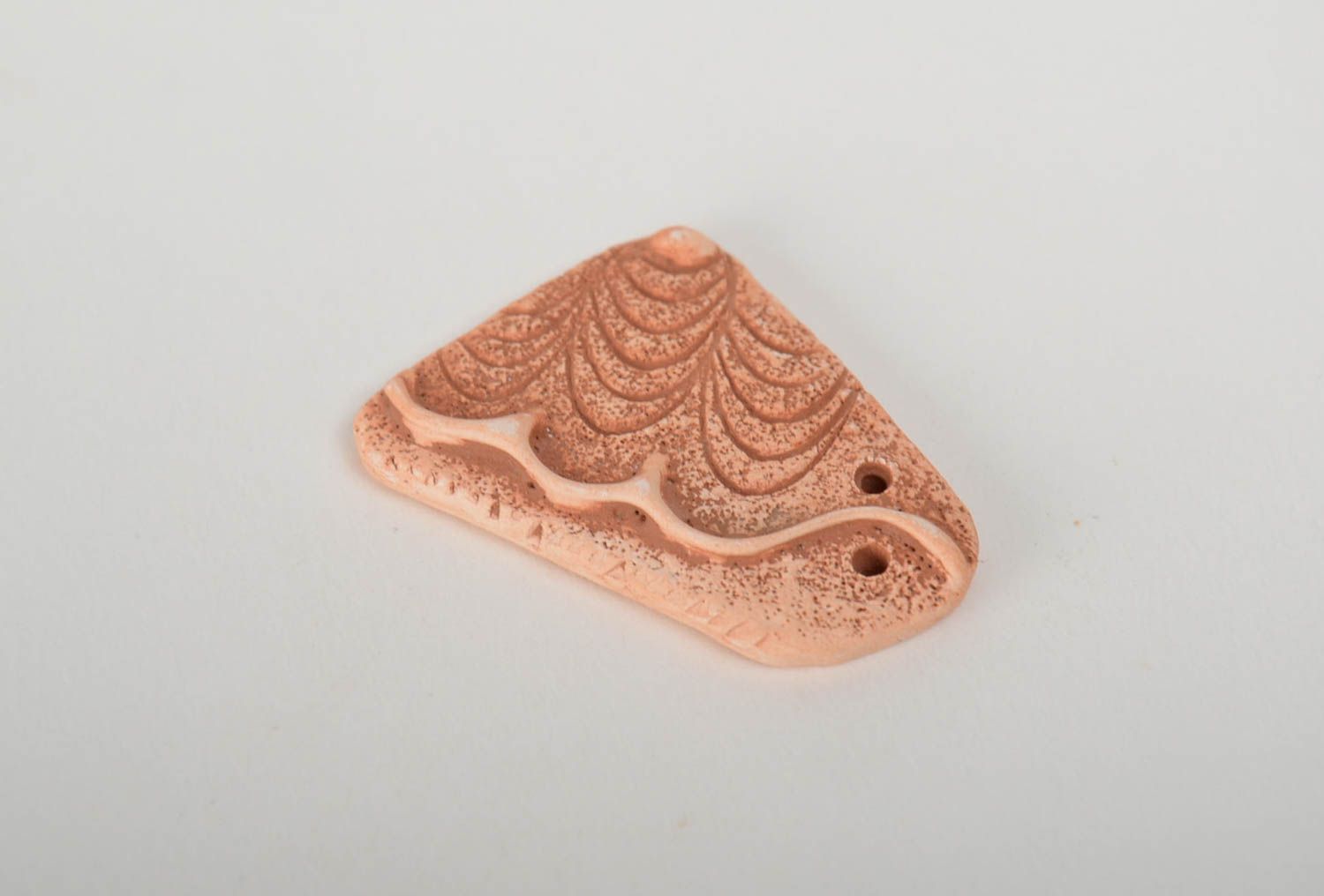Handmade decorative flat ceramic blank pendant with wave shaped pattern photo 4