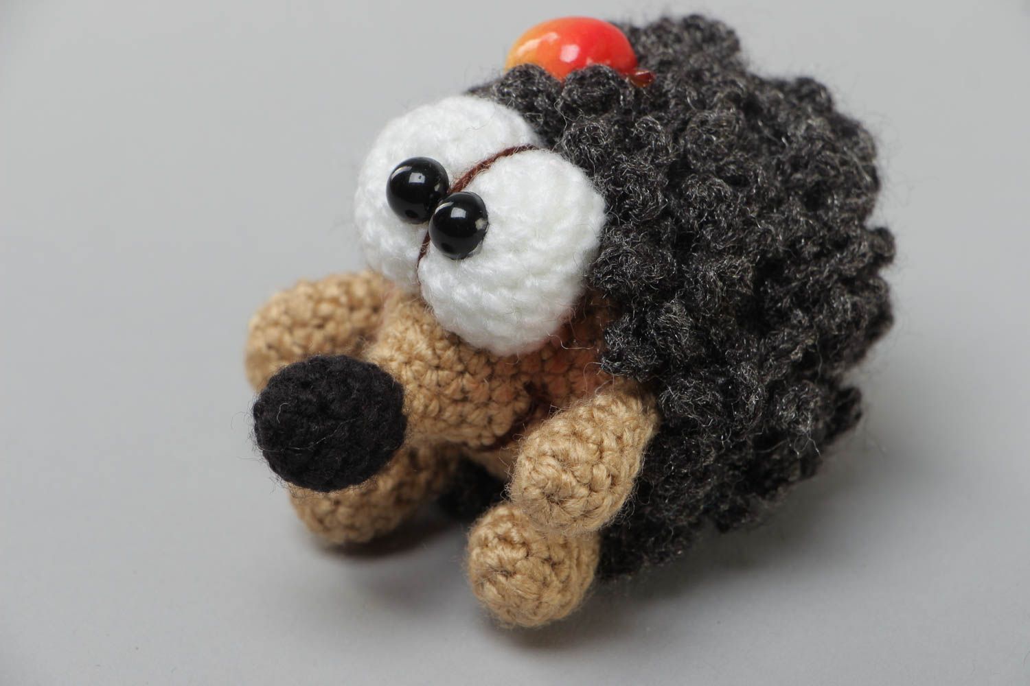 Handmade soft toy crocheted of acrylic threads funny hedgehog with apple photo 2