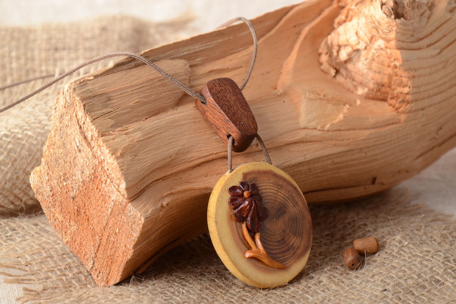 Handmade designer carved wooden neck pendant coated with varnish for women photo 1