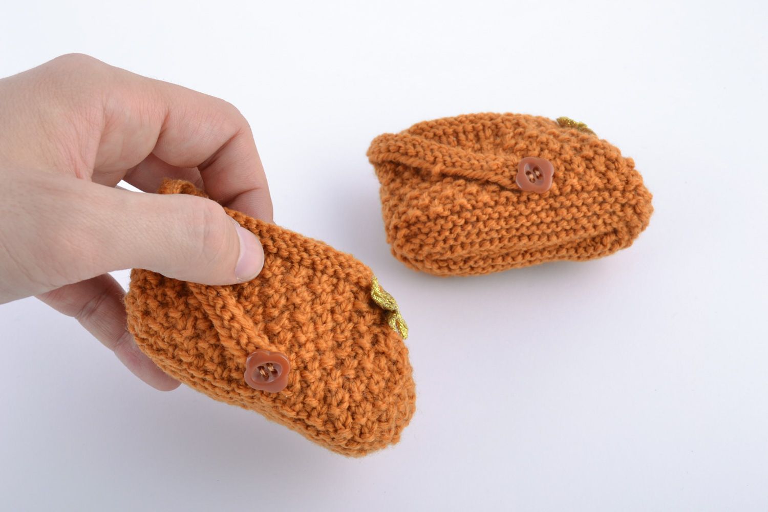 Handmade warm baby booties knitted of wool of light brown color for little girl photo 4