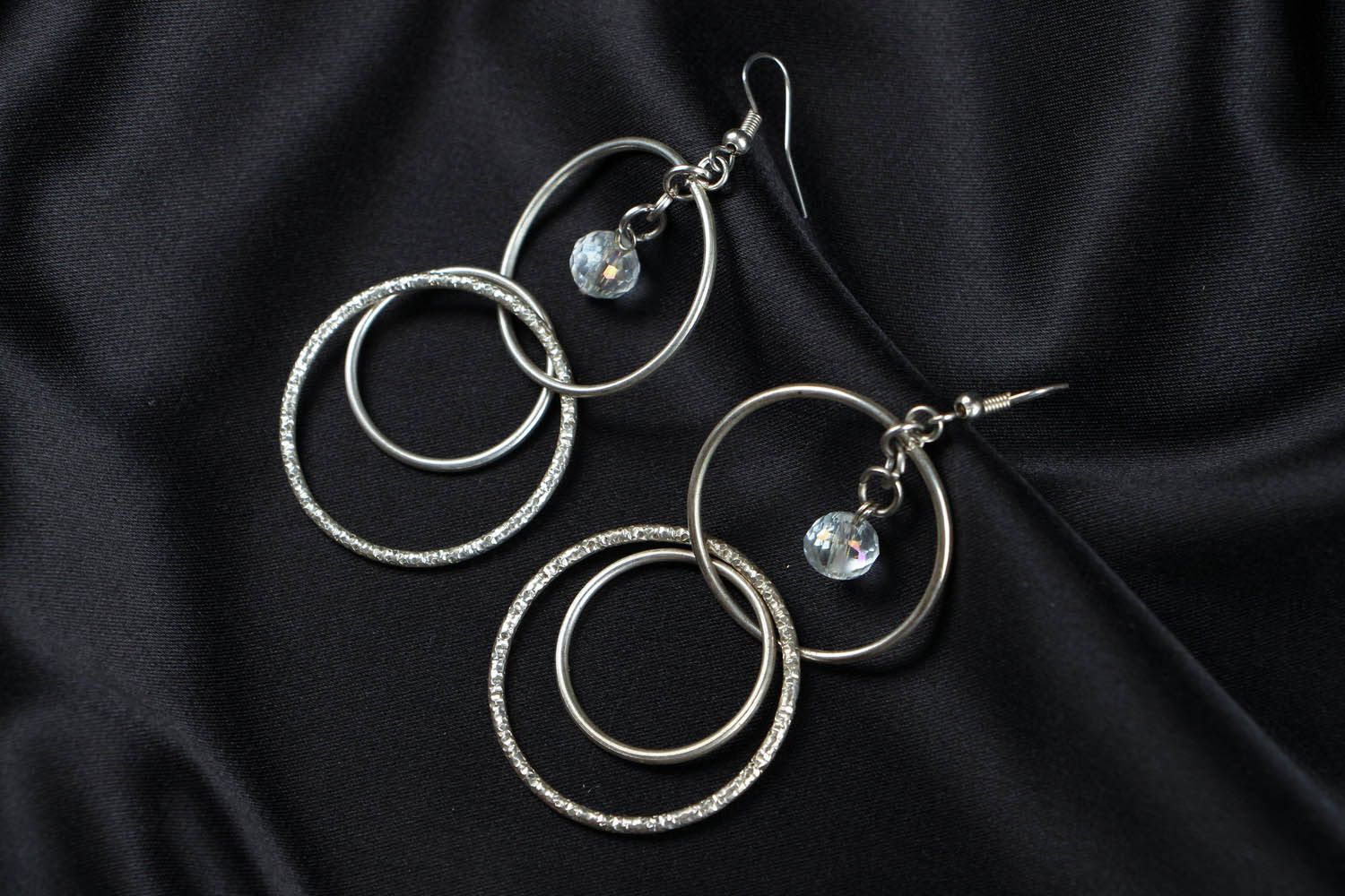 Metal earrings with crystal photo 1