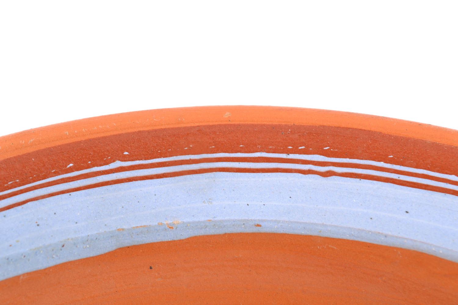 Ceramic bowl painted with engobes using flyandrovka technique photo 3