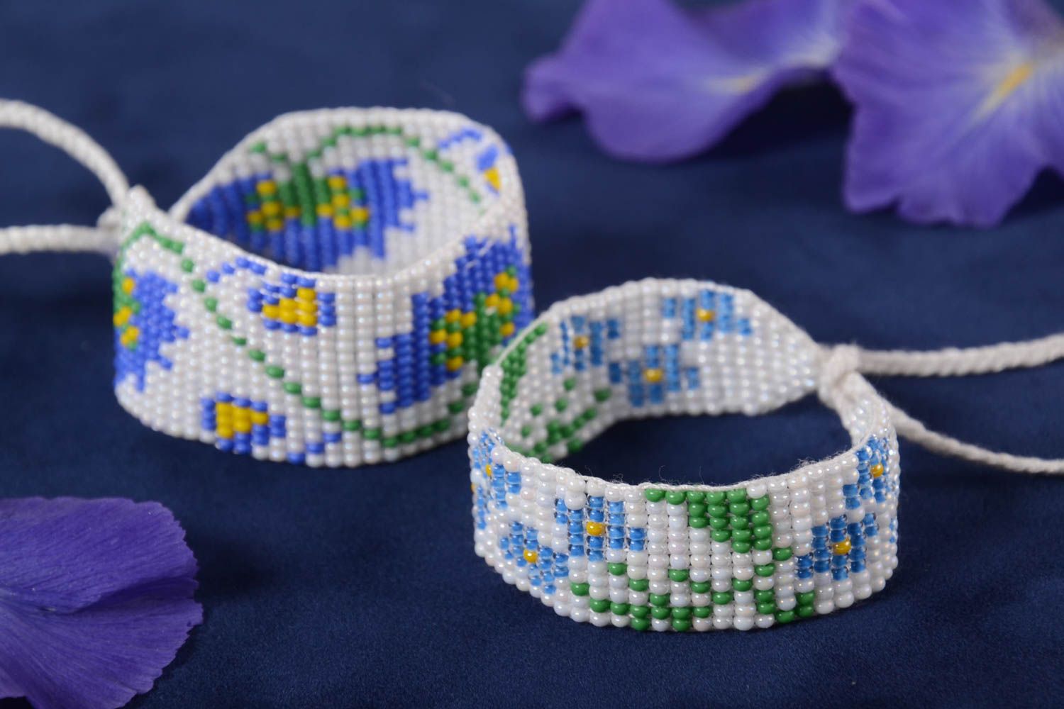 Strand beaded bracelet on a white rope with floral blue ornament set of two items photo 1