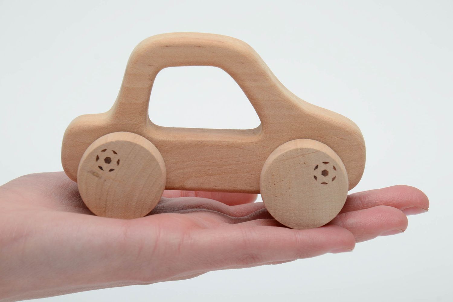 Wooden wheeled toy car for children photo 5