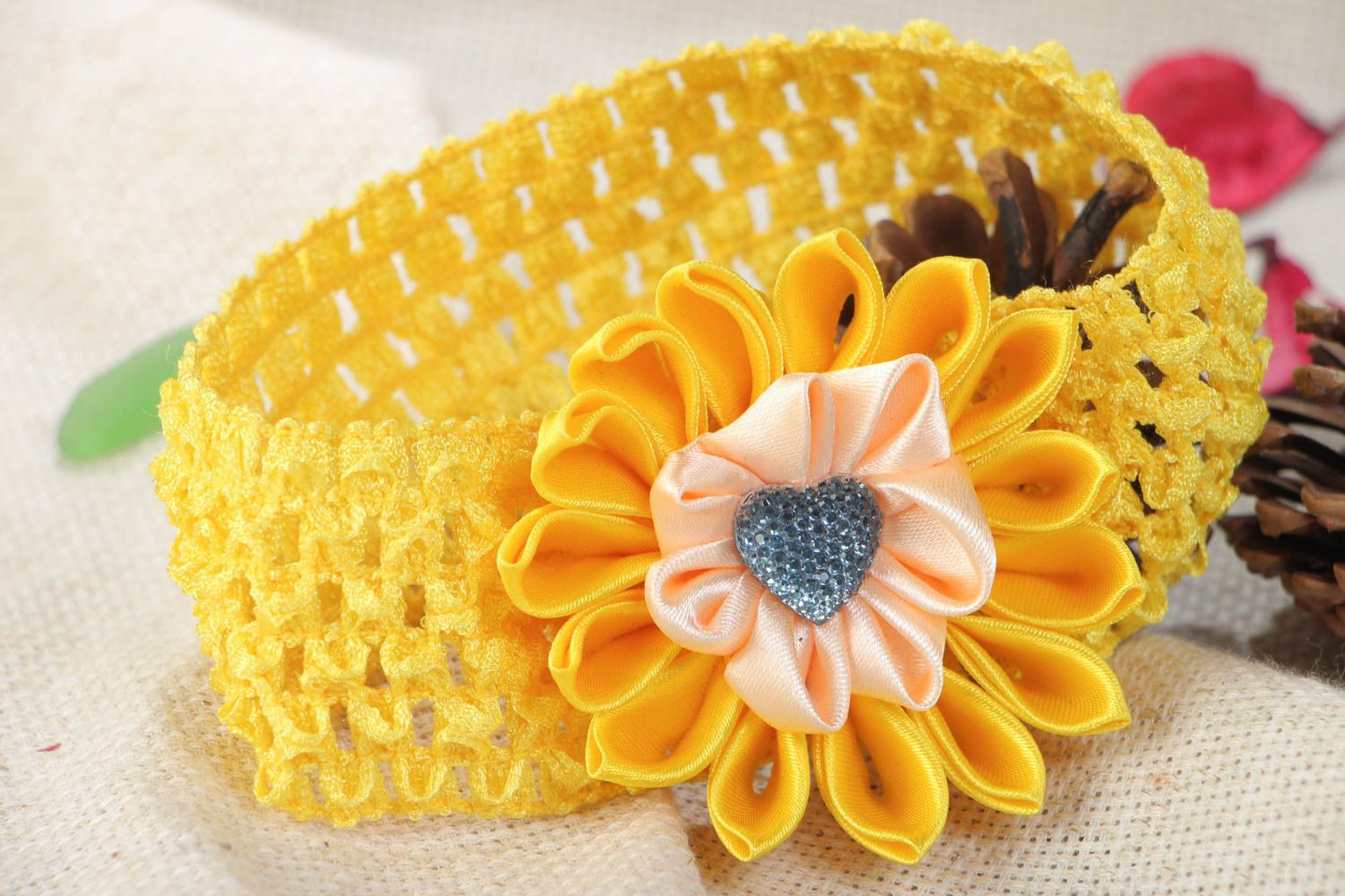 Handmade yellow headband with elastic lacy basis and satin ribbon flower photo 1