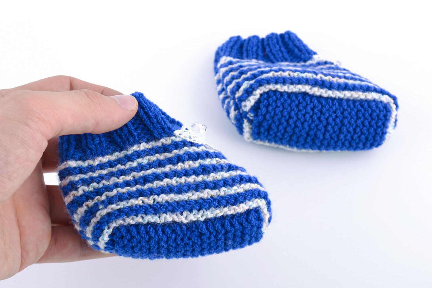 Handmade warm white and blue striped baby booties knitted of natural wool  photo 3