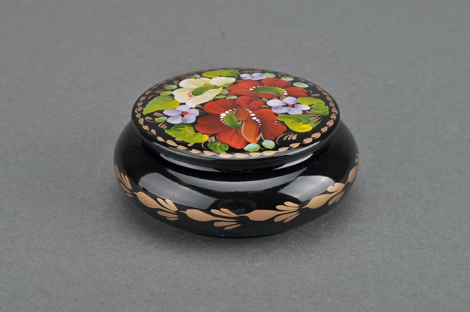 Caixa de madeira redonda com bordas convexas Papoilas florescentes foto 1