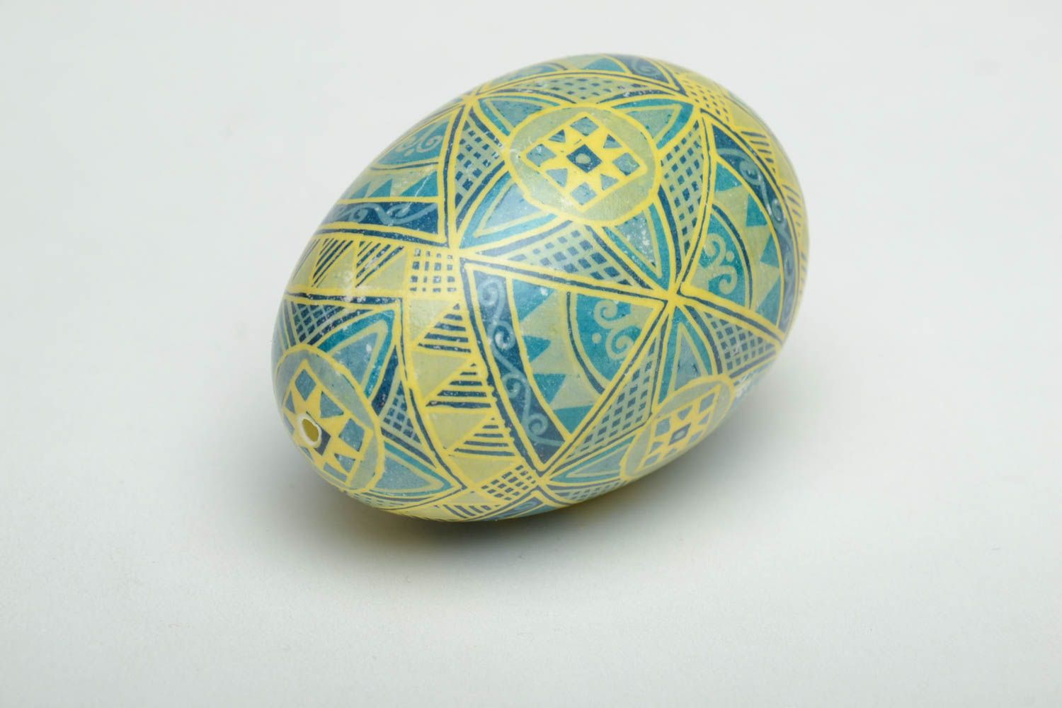 Easter egg with traditional symbolics painted with aniline dyes photo 4