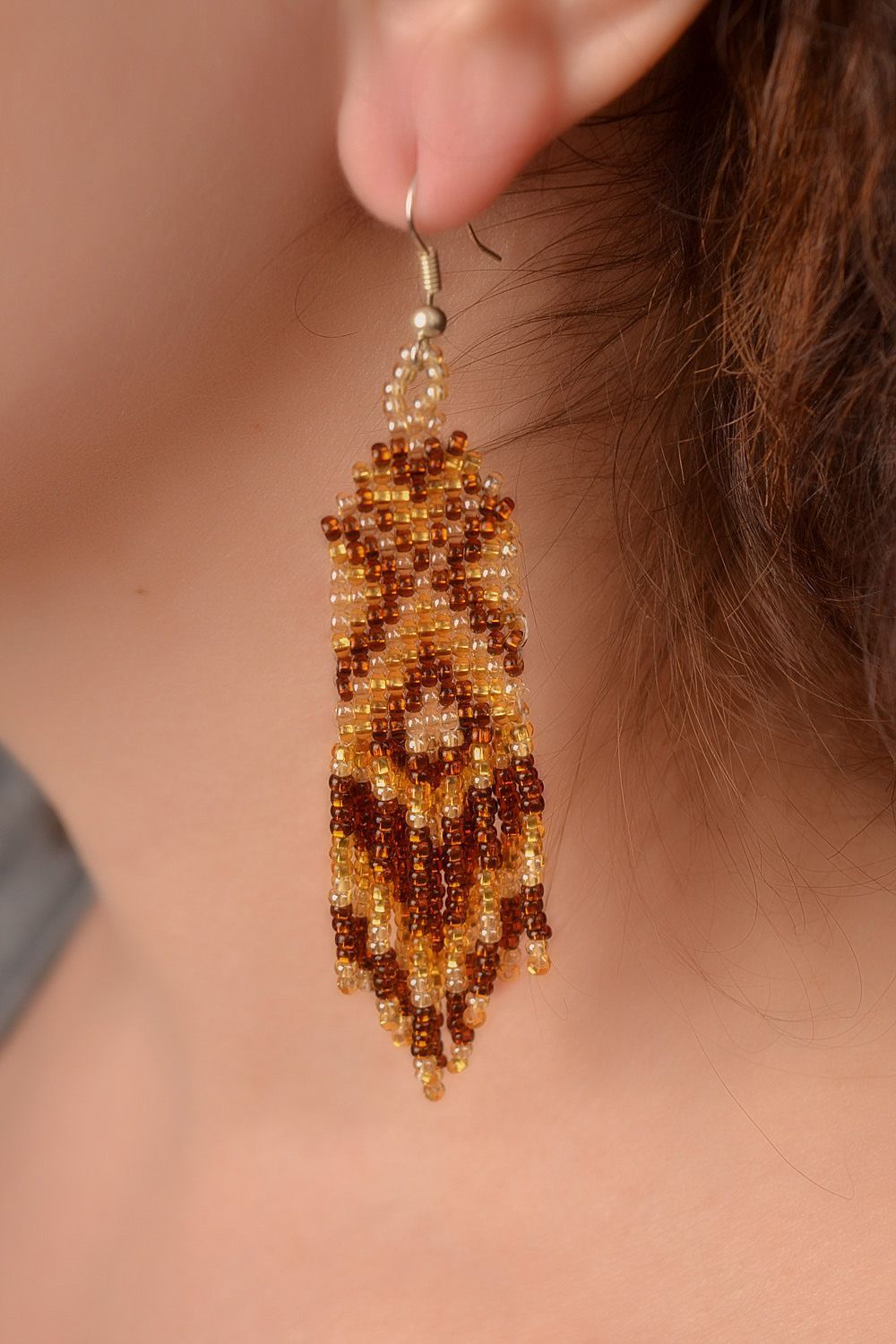 Handmade beaded dangling earrings with long fringe in brown color palette  photo 2