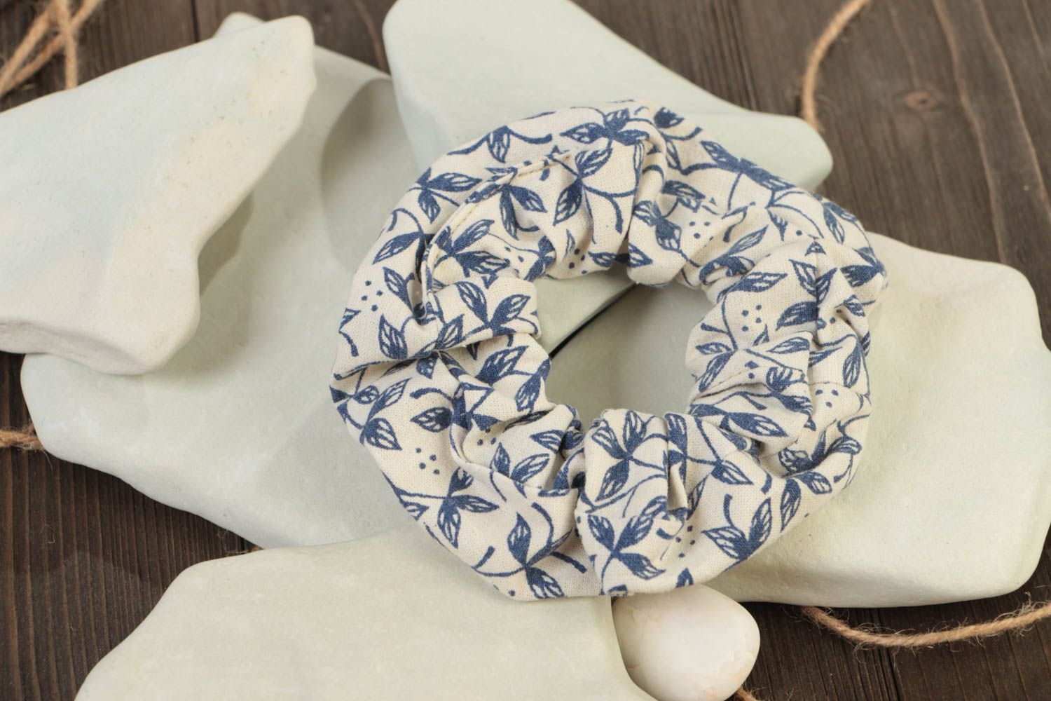 Decorative handmade hair tie sewn of white fabric with blue floral pattern photo 1